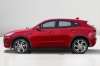 2019 Jaguar E-Pace P300 R-Dynamic AWD in Firenze Red Metallic from a left side view